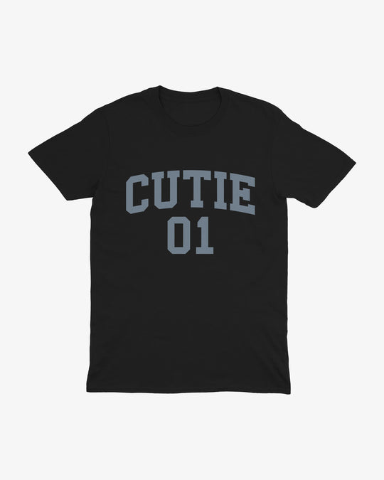 Cutie 01 t-shirt in black, varsity "CUTIE 01" lettering, front view