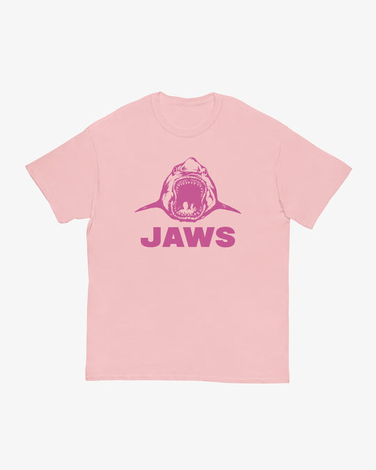 Jaws t-shirt in light pink, illustrated shark with open jaws above "Jaws" wordmark, front view