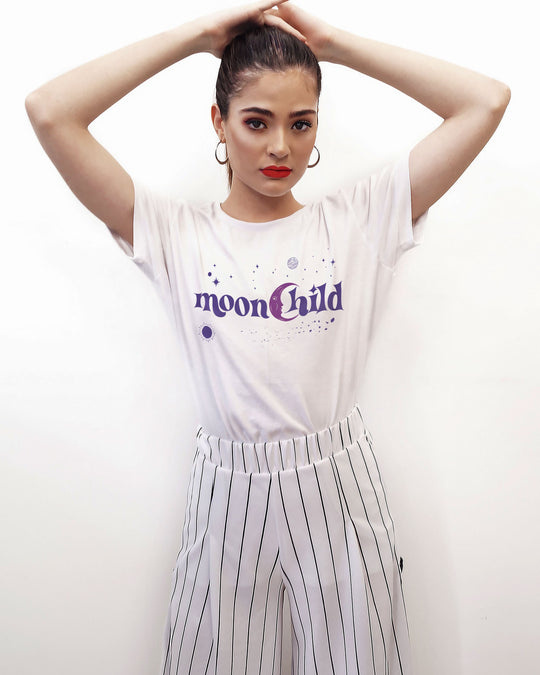 Moonchild t-shirt in white, worn by a model