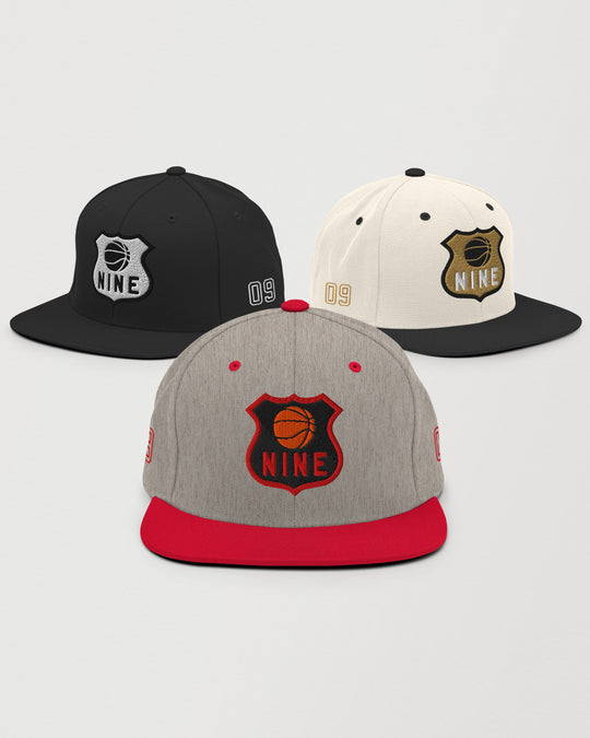 Nine snapback cap shown in natural, grey heather, and black