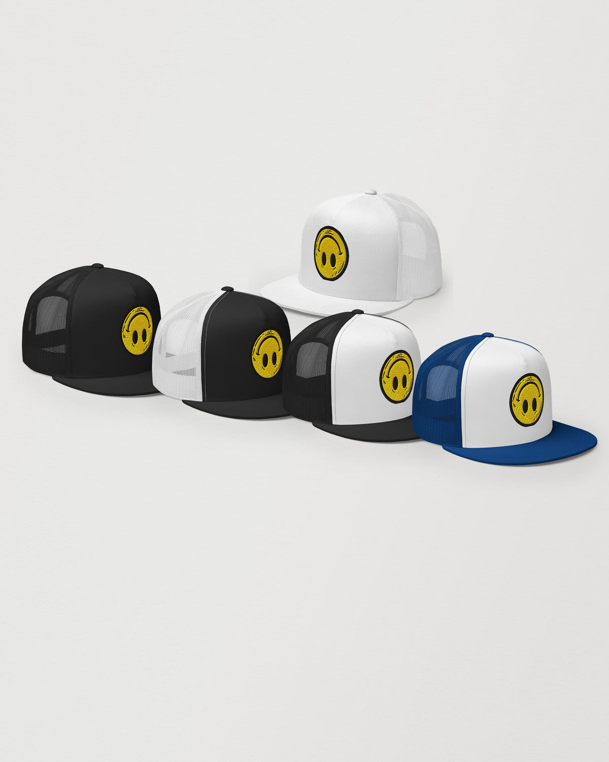 Smiley Up Down embroidered trucker cap by Wearrs, shown in black, white, black/white, white/black, and white/royal