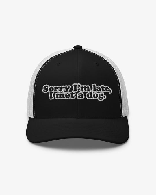 Sorry I'm Late, I Met A Dog embroidered trucker hat, black and white, front view