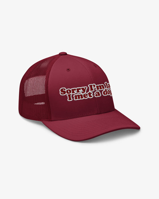 Sorry I'm Late, I Met A Dog embroidered trucker hat, cranberry, right side view