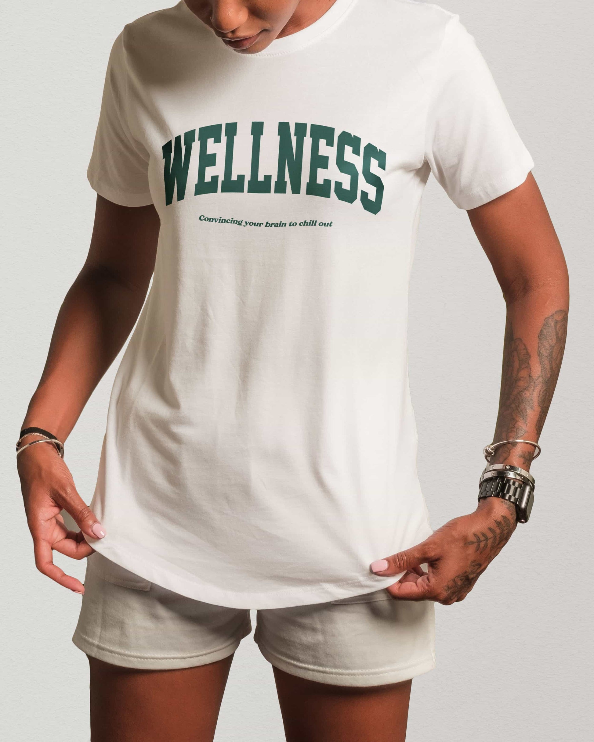 Wellness graphic t-shirt in white – on model photo – relaxed mental health luxury look – by Wearrs